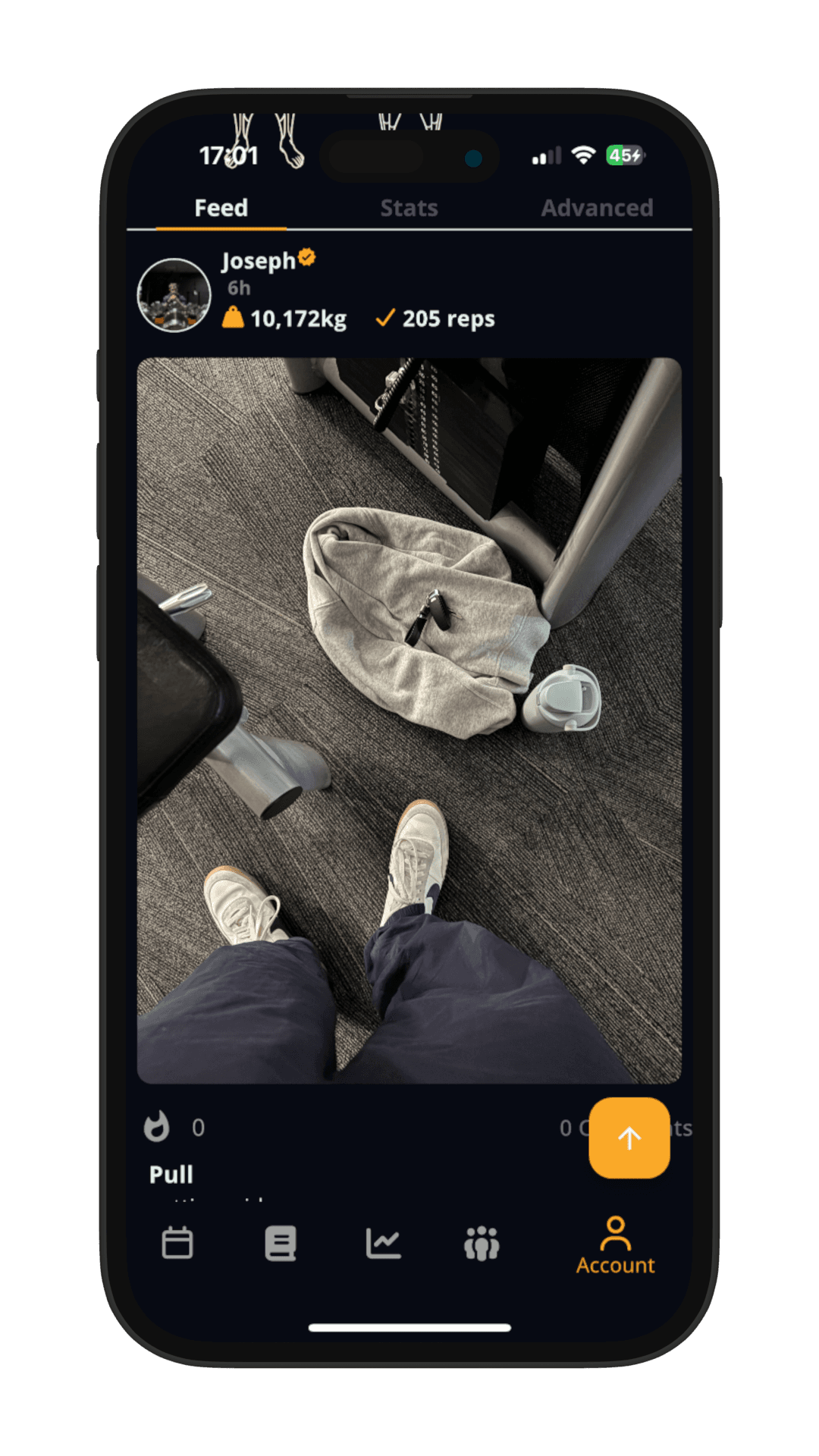 Stronger app social feed showing a shared workout post with total volume and reps from a pull session